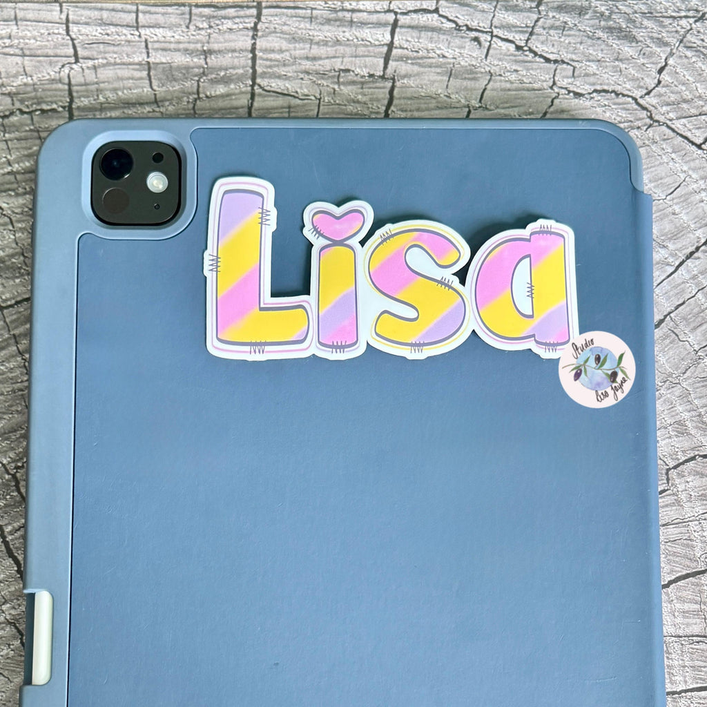 Pastel Rainbow Name Sticker Label - a blue rectangular device with a name sticker on it