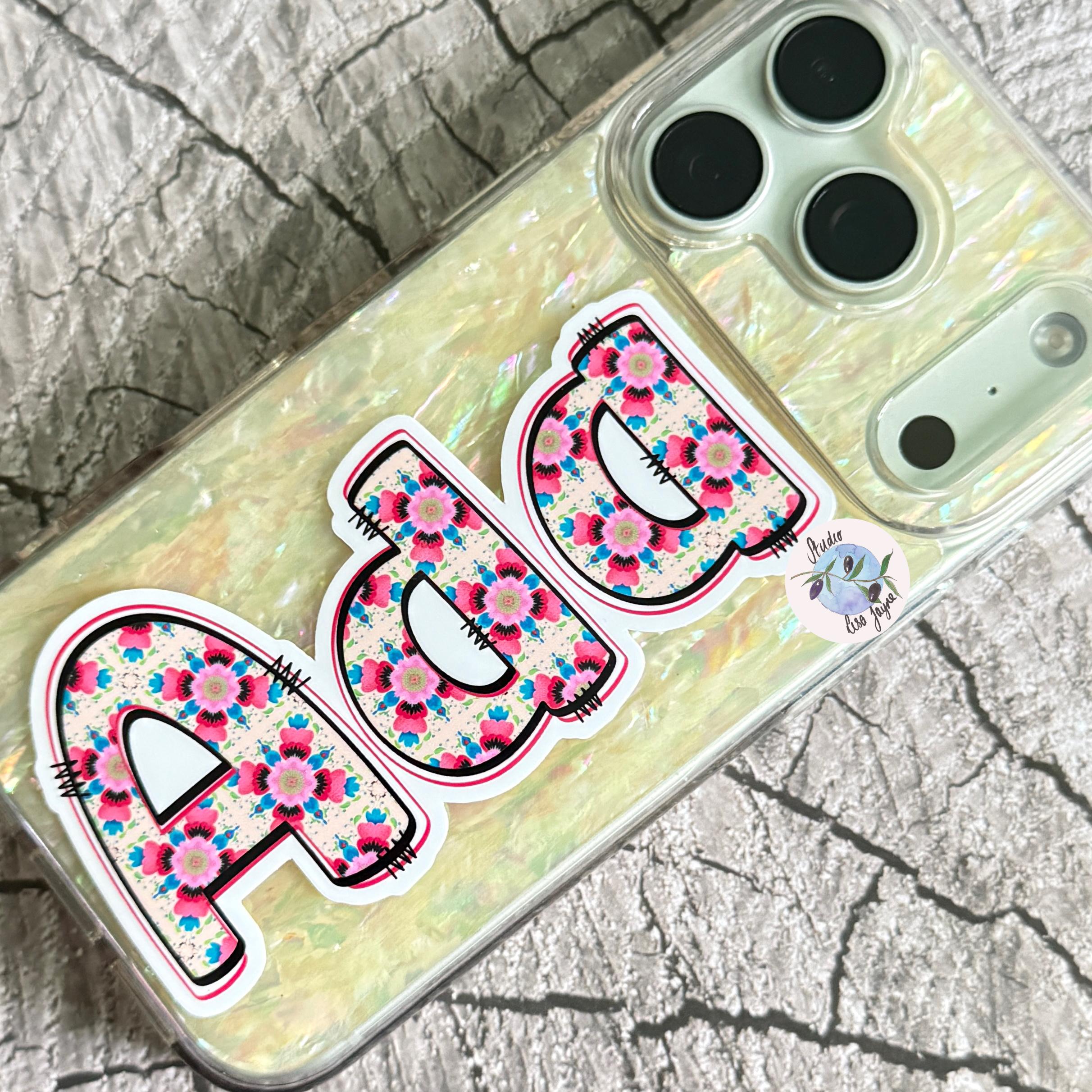 Floral Tile Name Sticker Label applied to iPhone