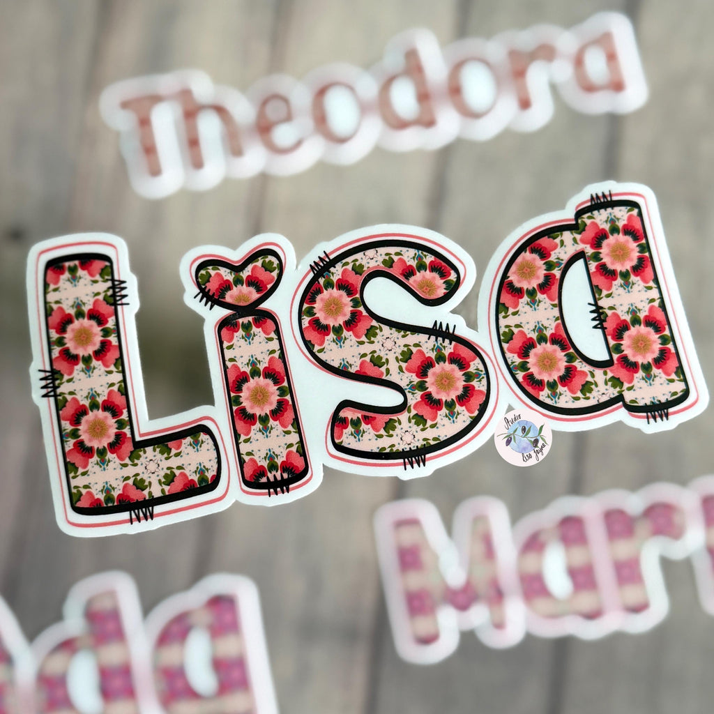 Floral Tile Name Sticker Label Lisa with other names blurred in the background