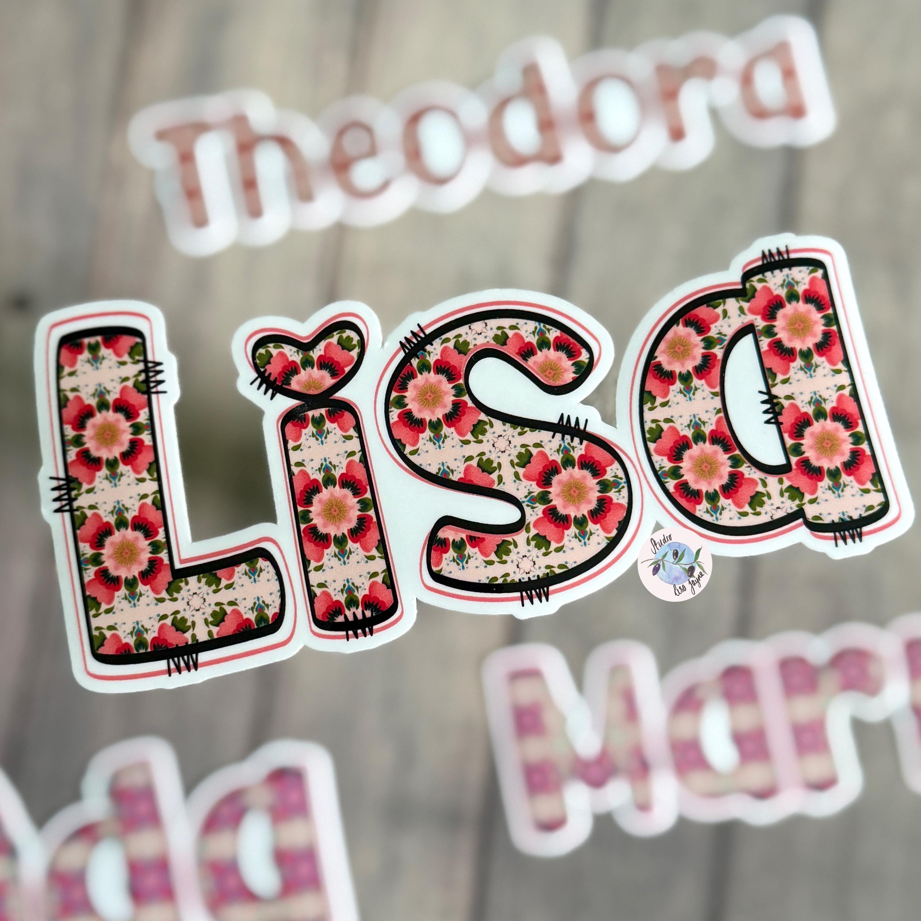 Floral Tile Name Sticker Label Lisa with other names blurred in the background