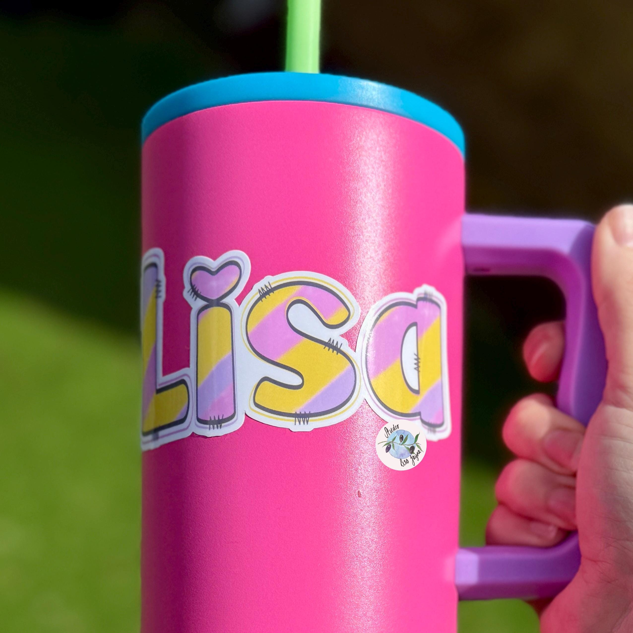 Pastel Rainbow Name Sticker Label - a hand holding a pink cup with a straw