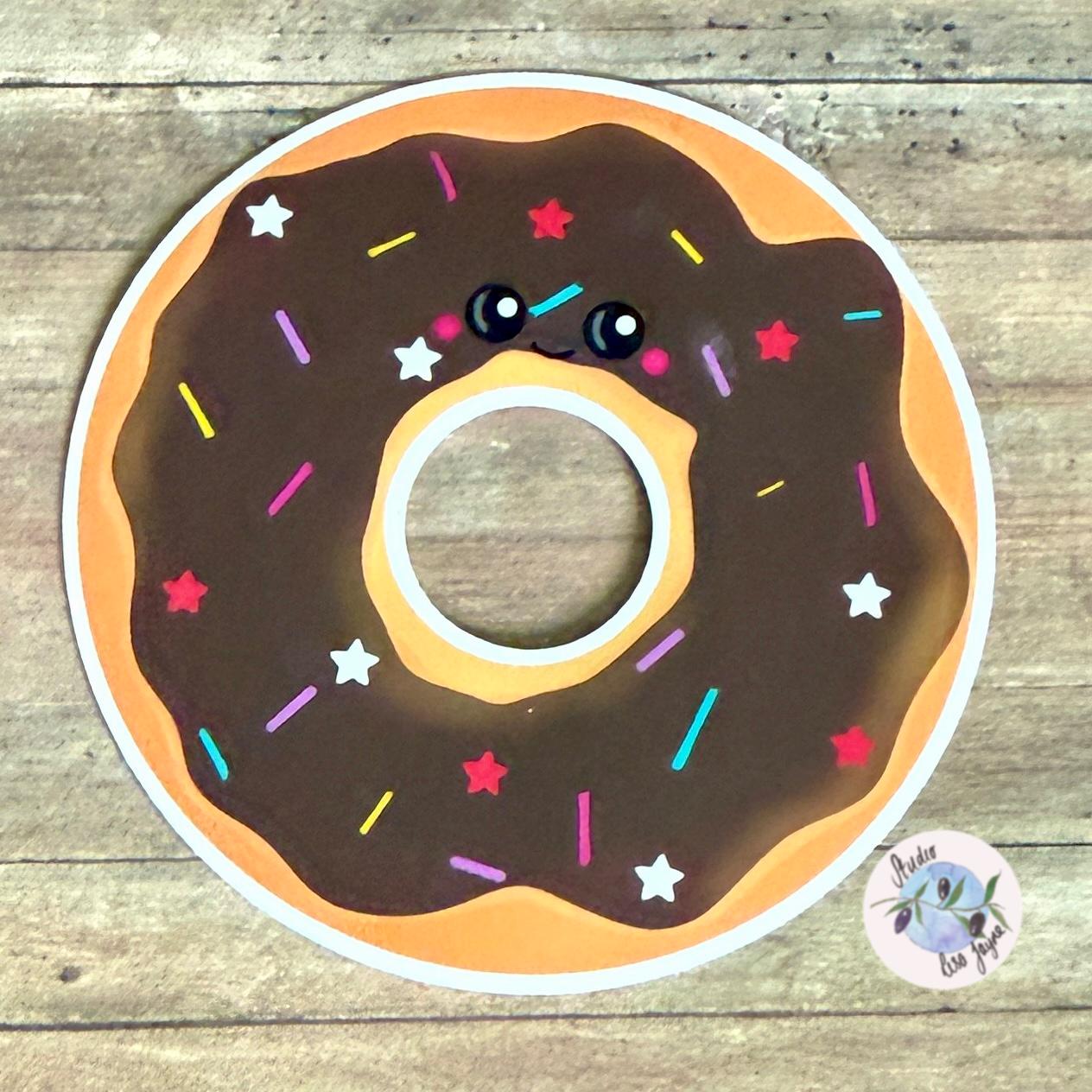 Doughnut Donut Hand Illustrated Waterproof Vinyl Sticker - a doughnut with sprinkles on a wood surface