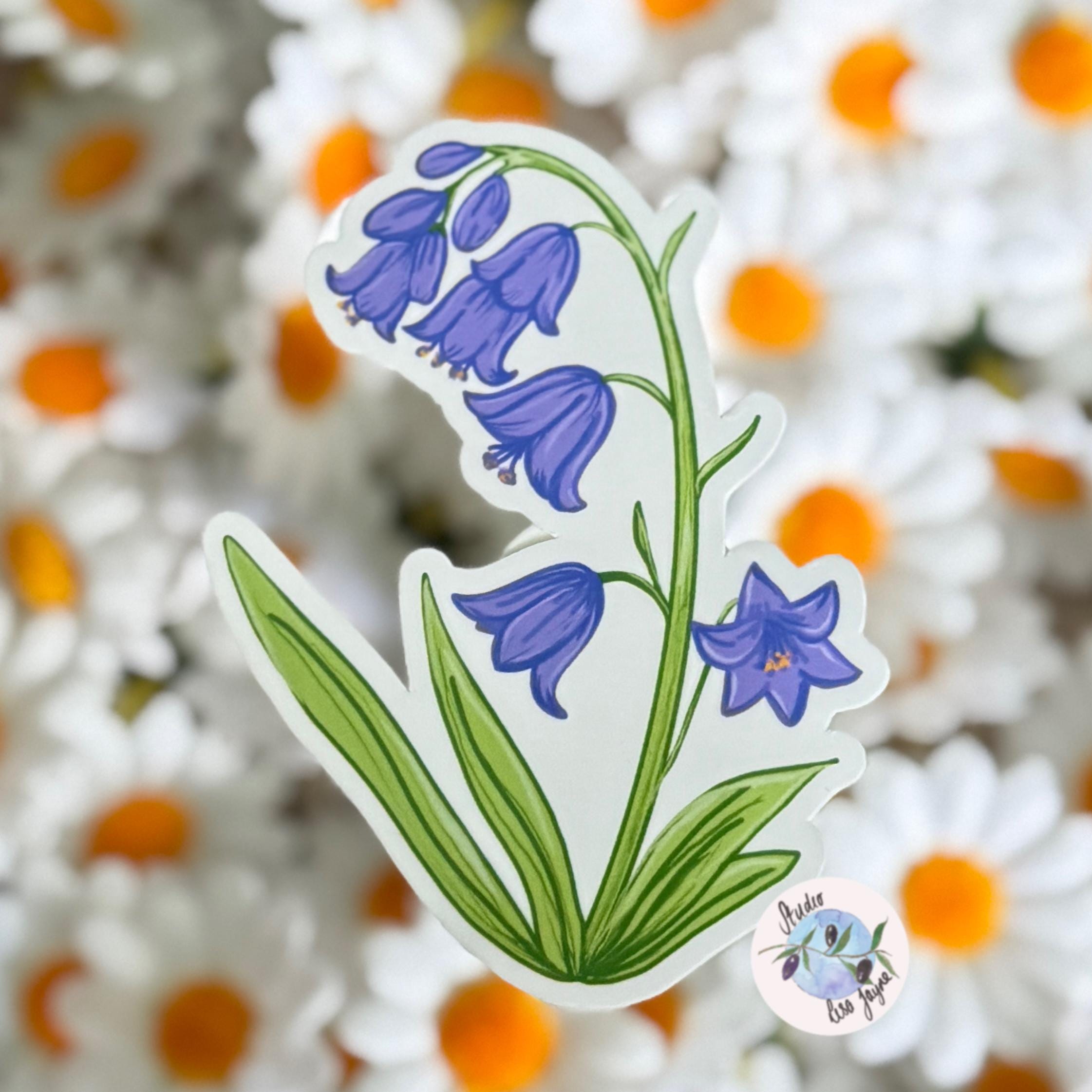 Bluebells Hand Illustrated Waterproof Vinyl Sticker - a sticker of bluebells on a stem with white and yellow flowers