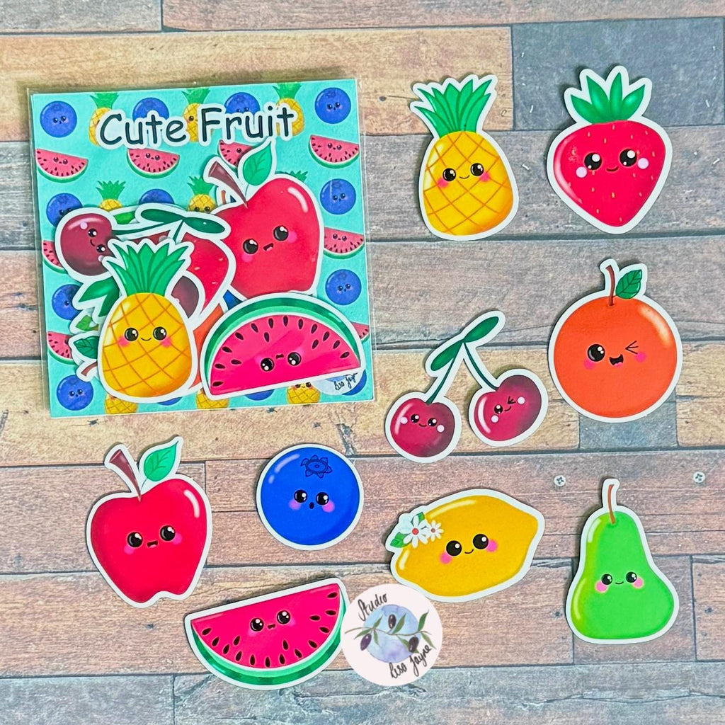 Cute Fruit Sticker Pack Hand Illustrated - a group of cute fruit stickers on a wood surface.  Designed by Studio Lisa Jayne