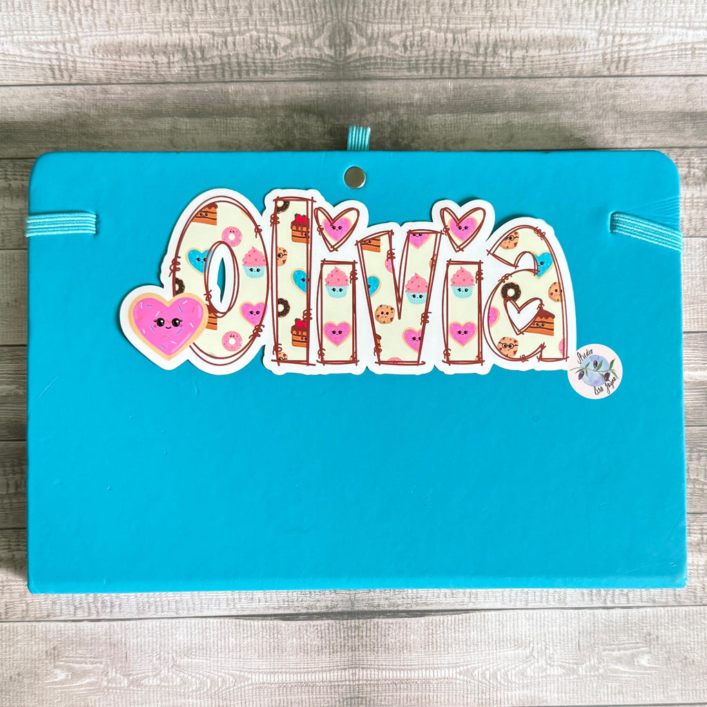 Sweet Treats Name Sticker for Smooth Surfaces - a blue sign with a name on it