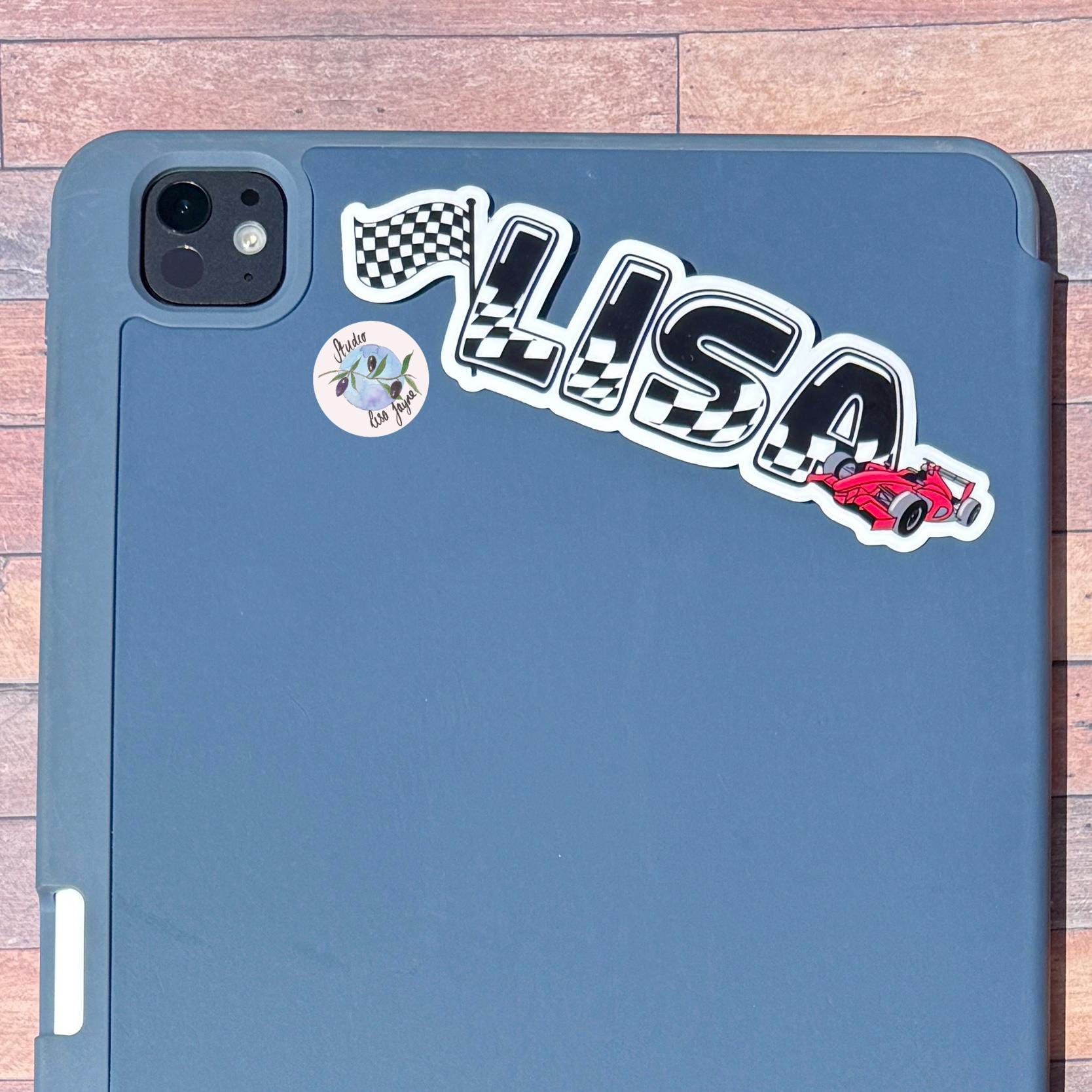 F1 Racing Car Name Sticker Label - a blue tablet with a sticker on it