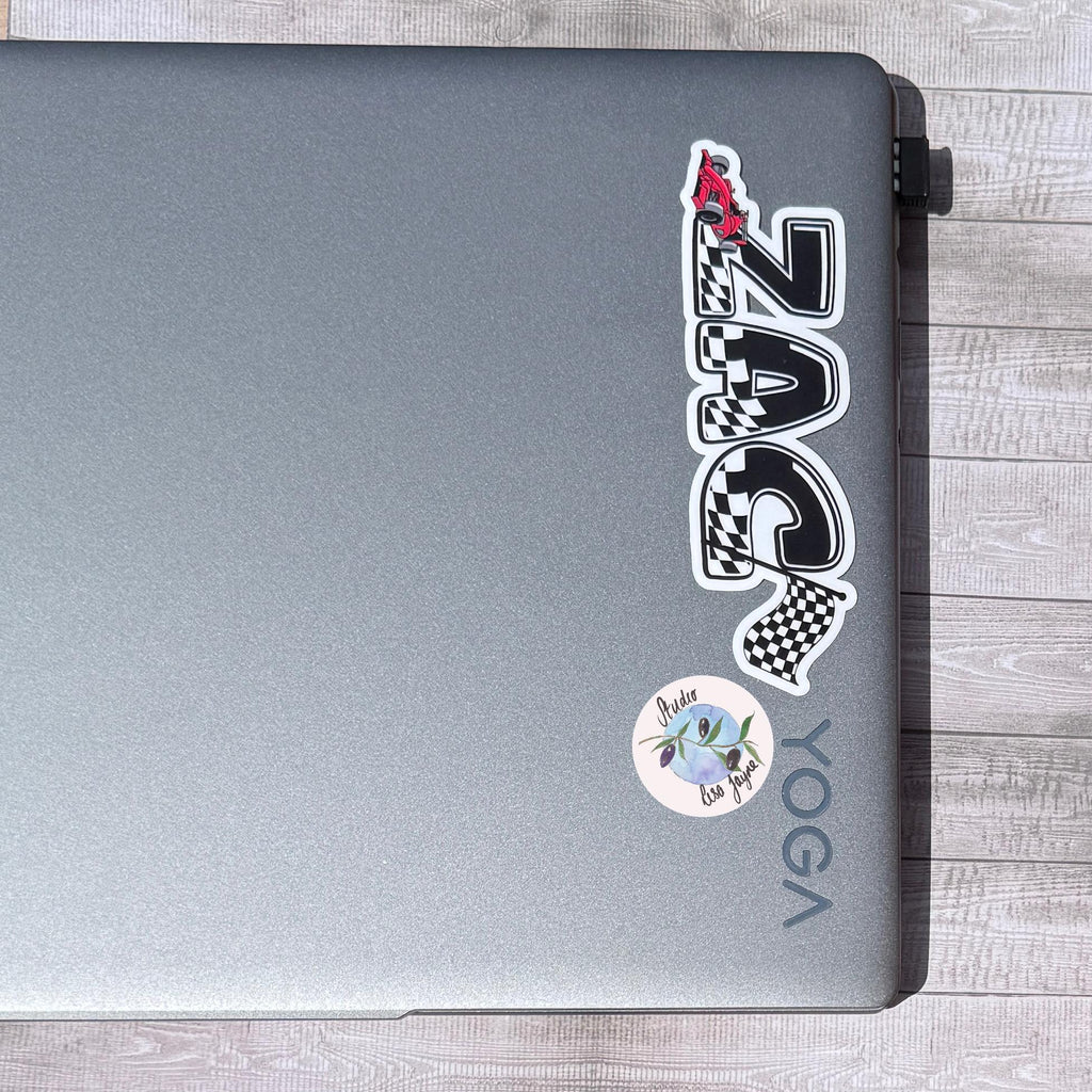 F1 Racing Car Name Sticker Label - a laptop with stickers on it