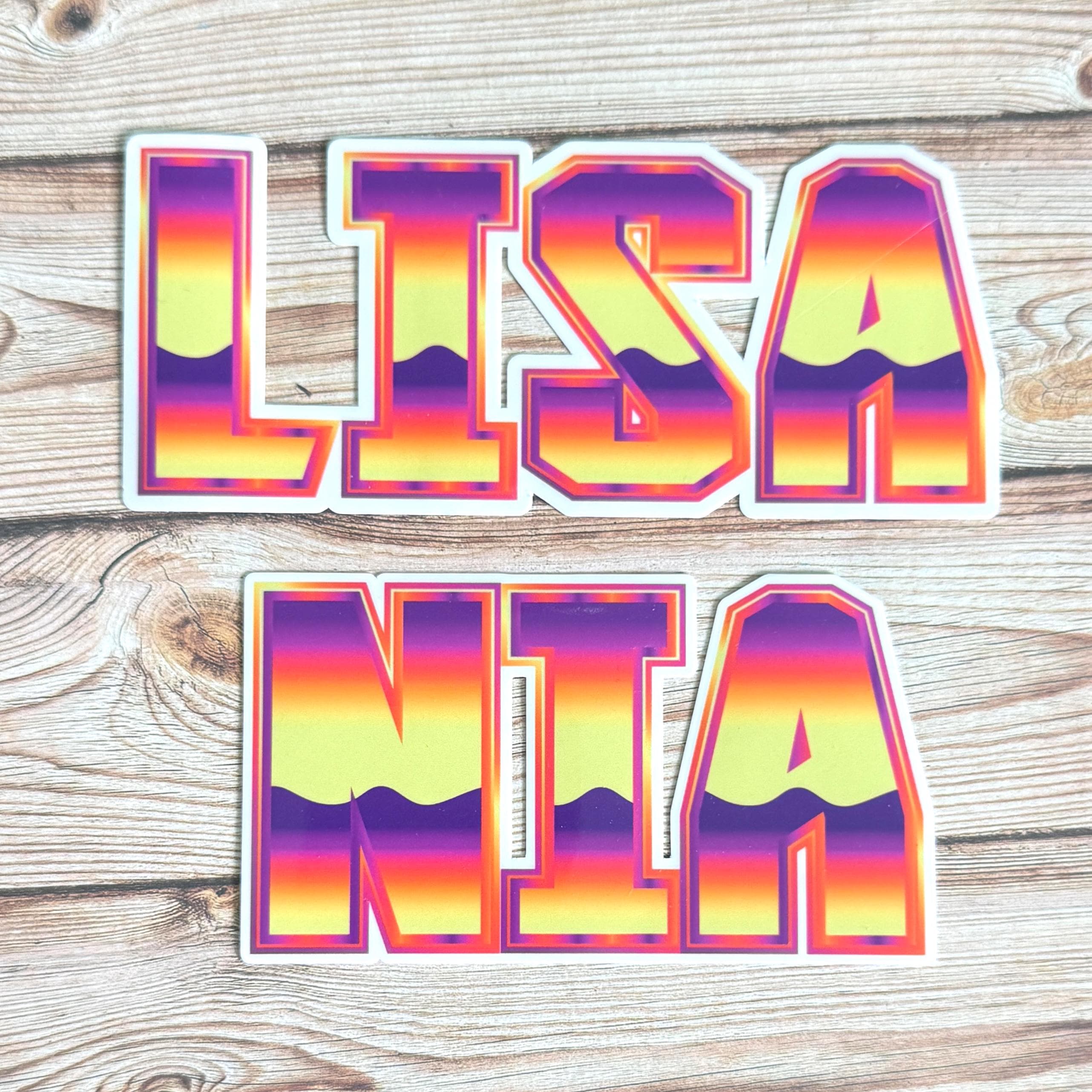 80s Wave Name Sticker Label - a pair of colorful letters on a wood surface