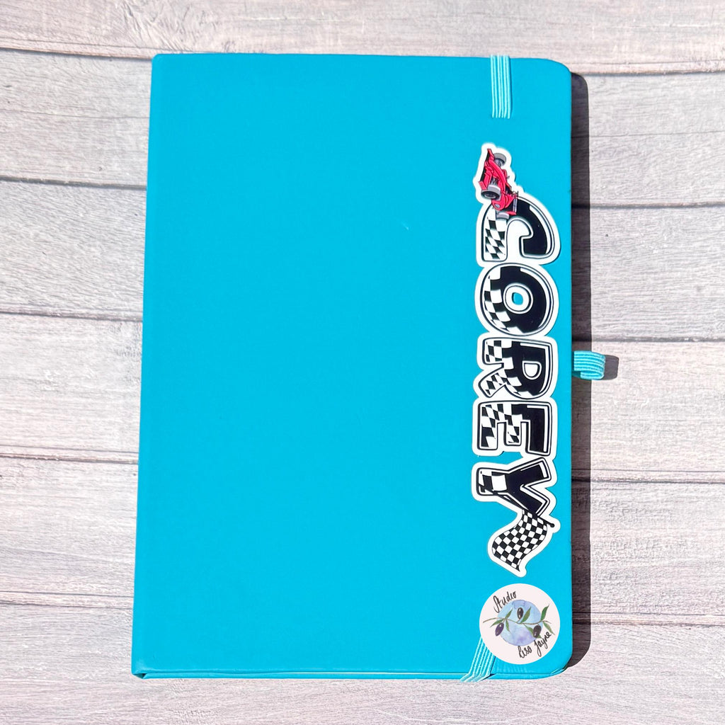 F1 Racing Car Name Sticker Label - a blue notebook with a sticker on it