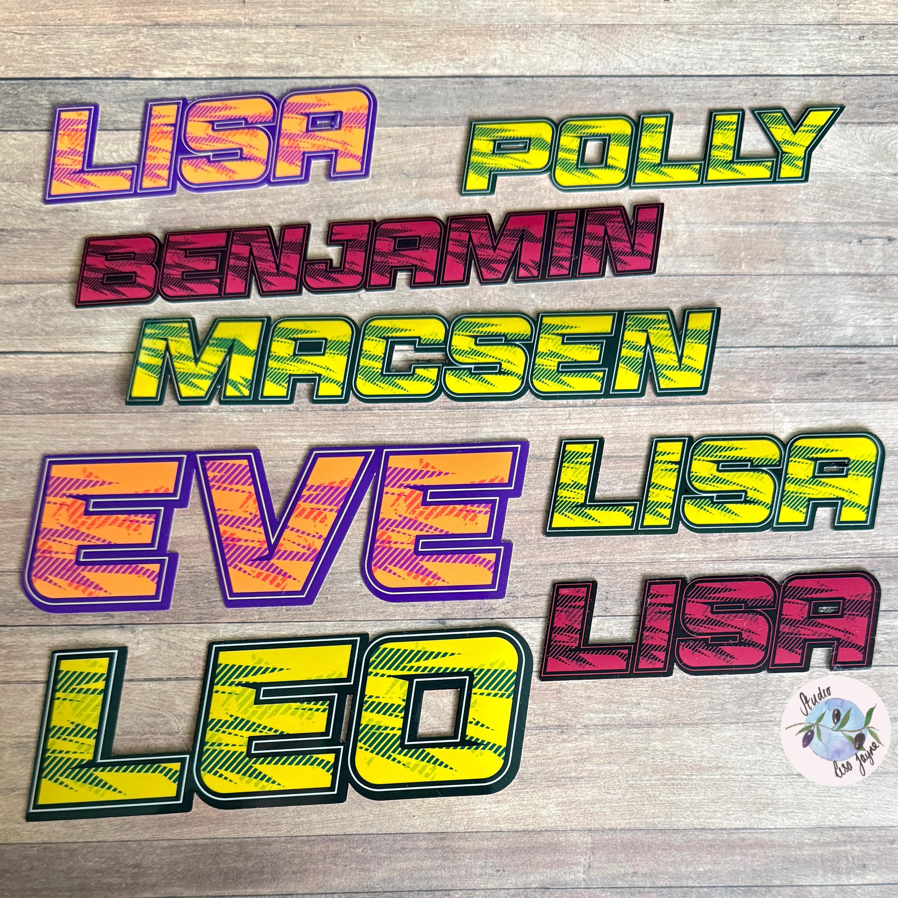 Sport Retro Name Sticker Sticker Label - a group of colorful text on a wood surface