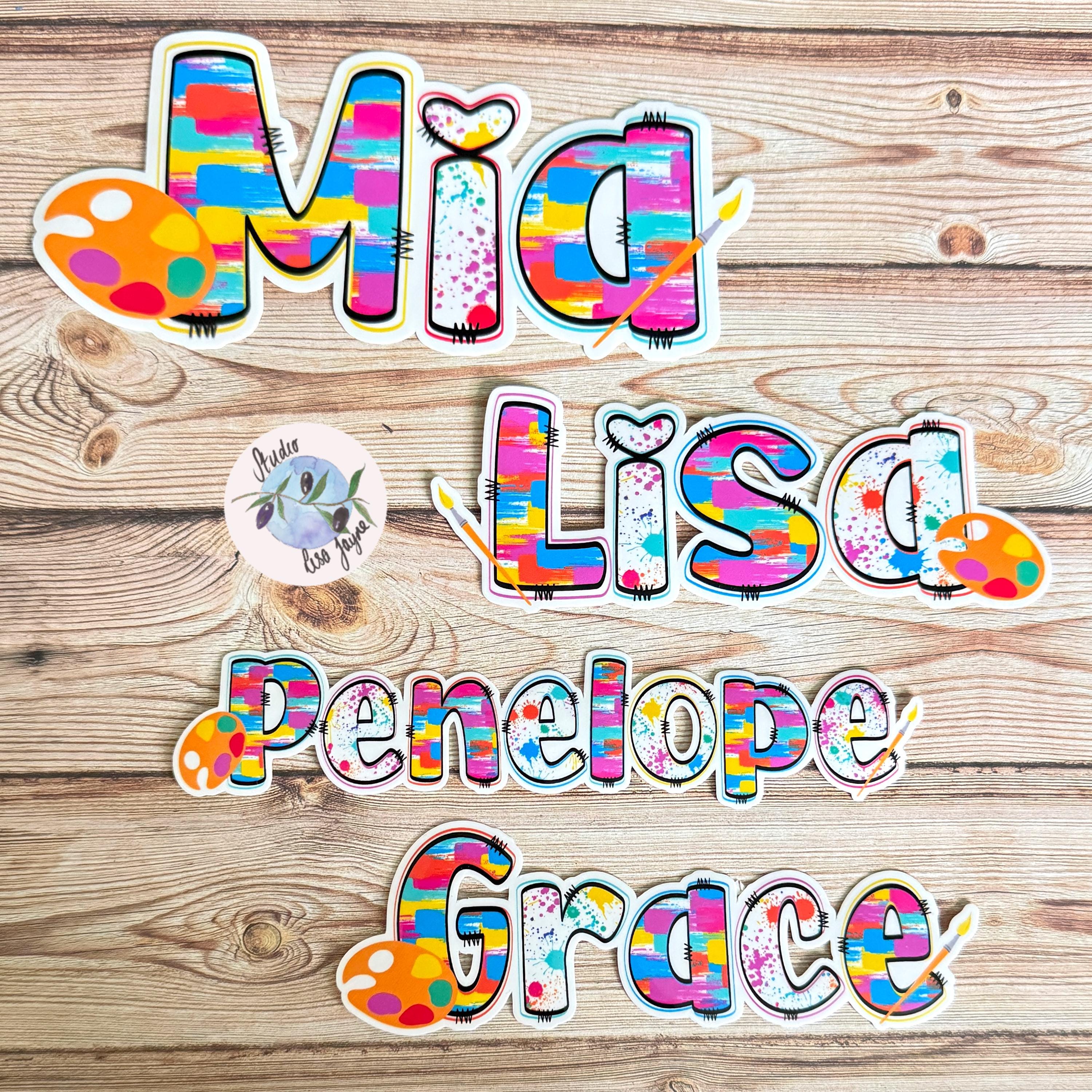 Artist Painter Painting Name Sticker Label - a group of colorful letters on a wood surface