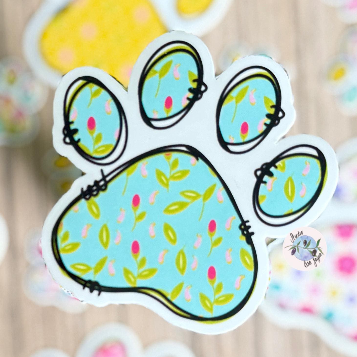 Floral Paw Print - Cat, Dog - Waterproof Vinyl Sticker - a sticker of a paw print with green leaves floral pattern