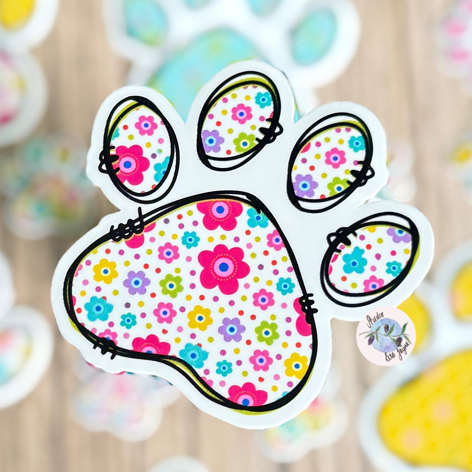 Floral Paw Print - Cat, Dog - Waterproof Vinyl Sticker - a sticker of a paw print with bright colourful mixed pattern 