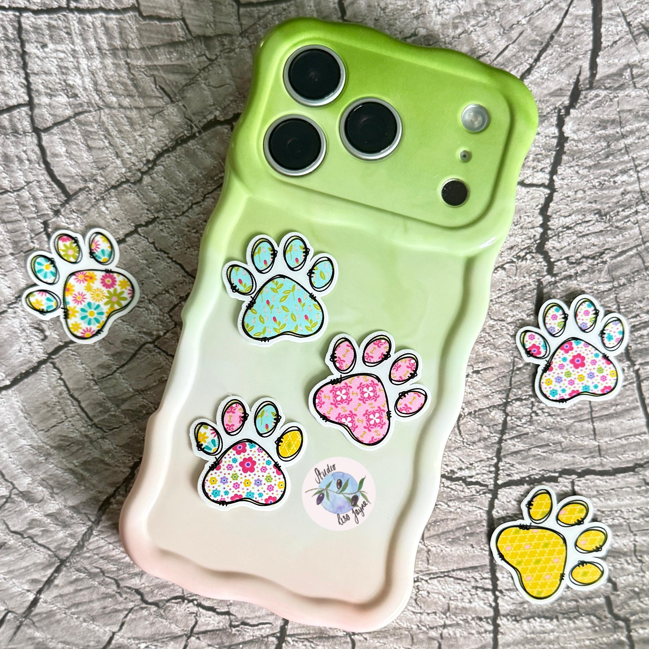Floral Paw Print - Cat, Dog - Waterproof Vinyl Sticker - a phone case with paw prints on it