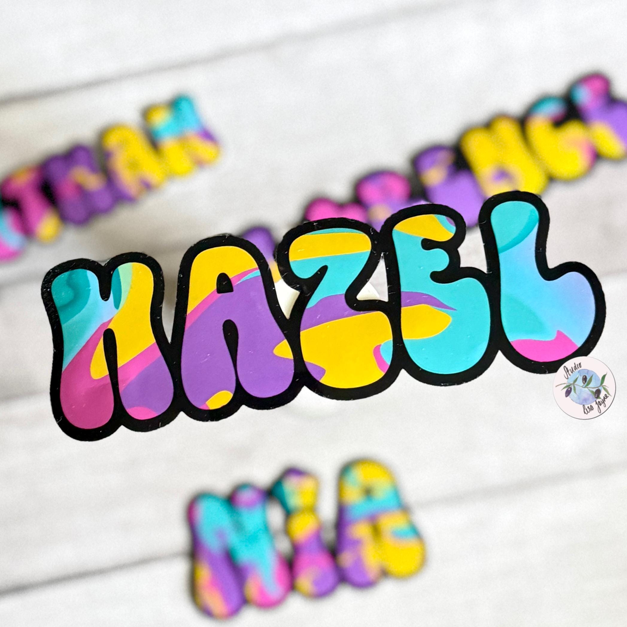 Colourful Retro Swirly Name Sticker Label - a close up of a name
