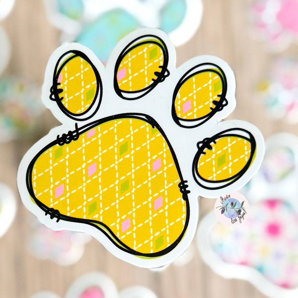 Floral Paw Print - Cat, Dog - Waterproof Vinyl Sticker - a sticker of a paw print with yellow argyle pattern
