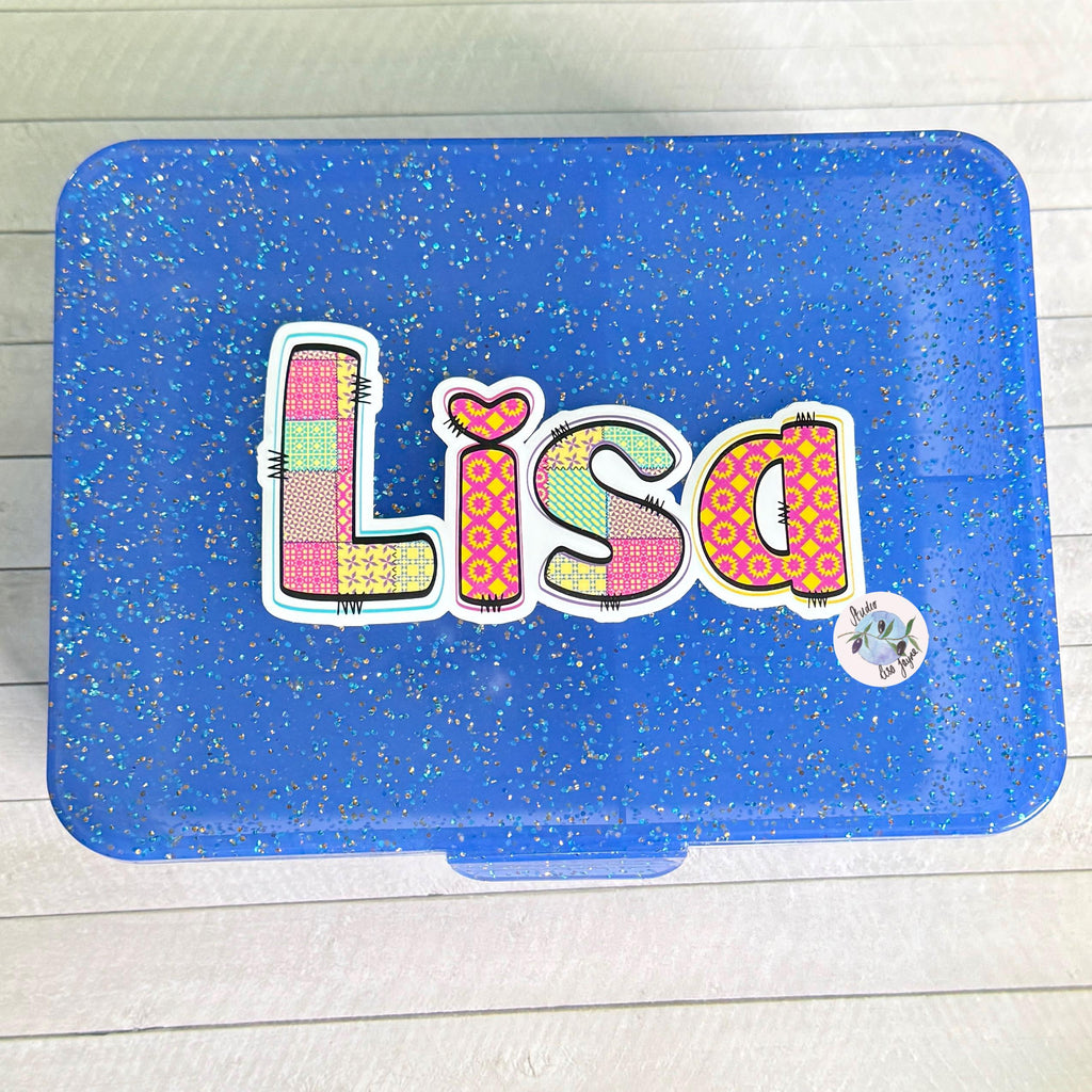 Patchwork Style Name Sticker Label - a blue plastic container with a name sticker