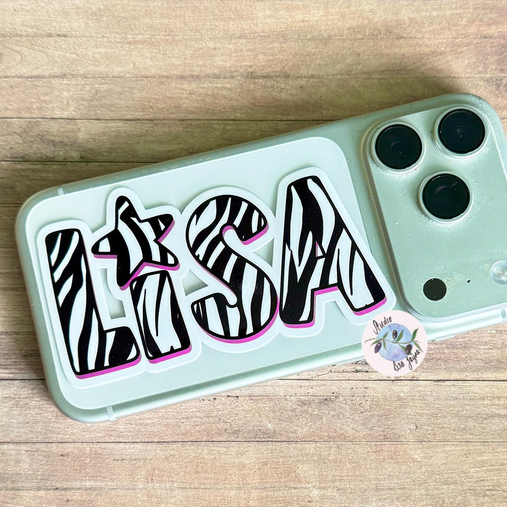 Zebra Print Name Sticker Label Kids - an iPhone with zebra style name stickers