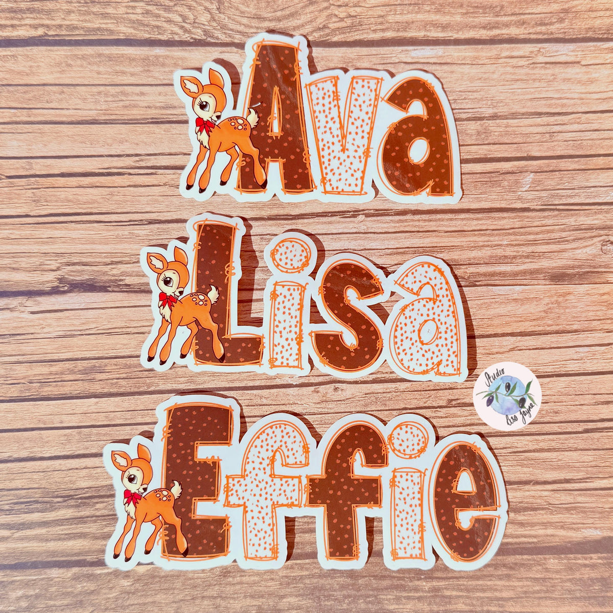 Deer Print Name Sticker Label Kids - a group of cartoon deer on a wood surface