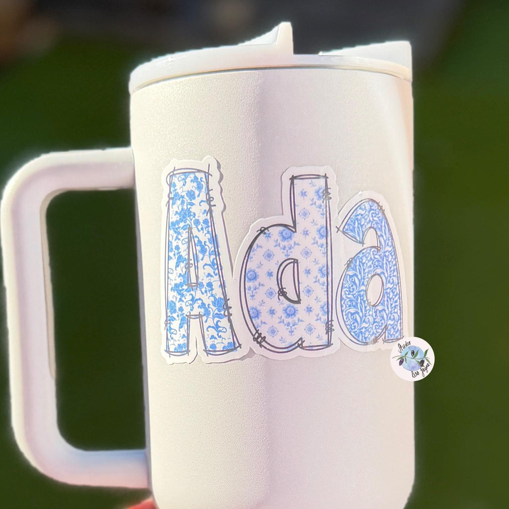Floral Blue and White Name Sticker Label Kids - a white mug drink bottle with blue letters on it