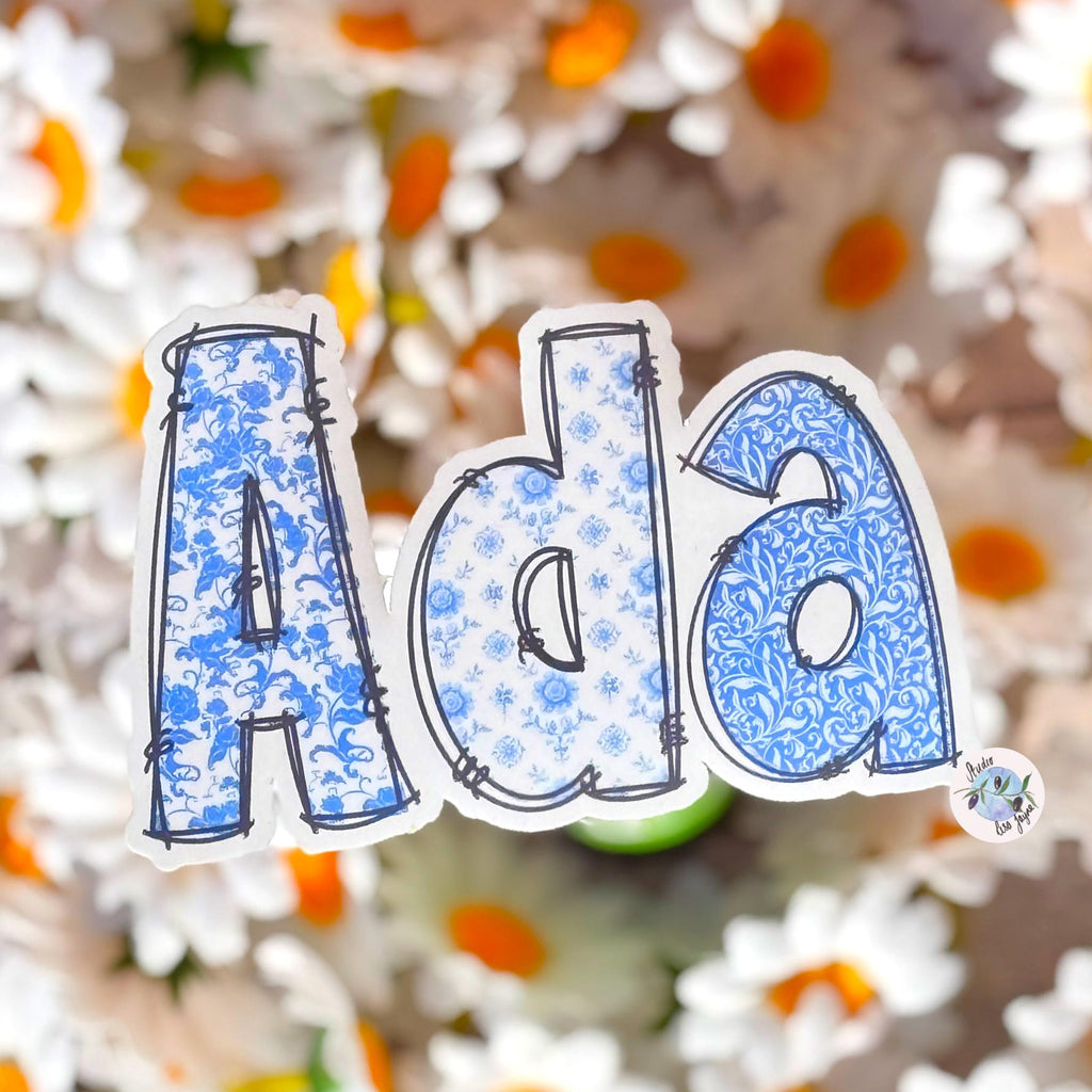 Floral Blue and White Name Sticker Label Kids - a blue and white sticker with flowers.  Ada