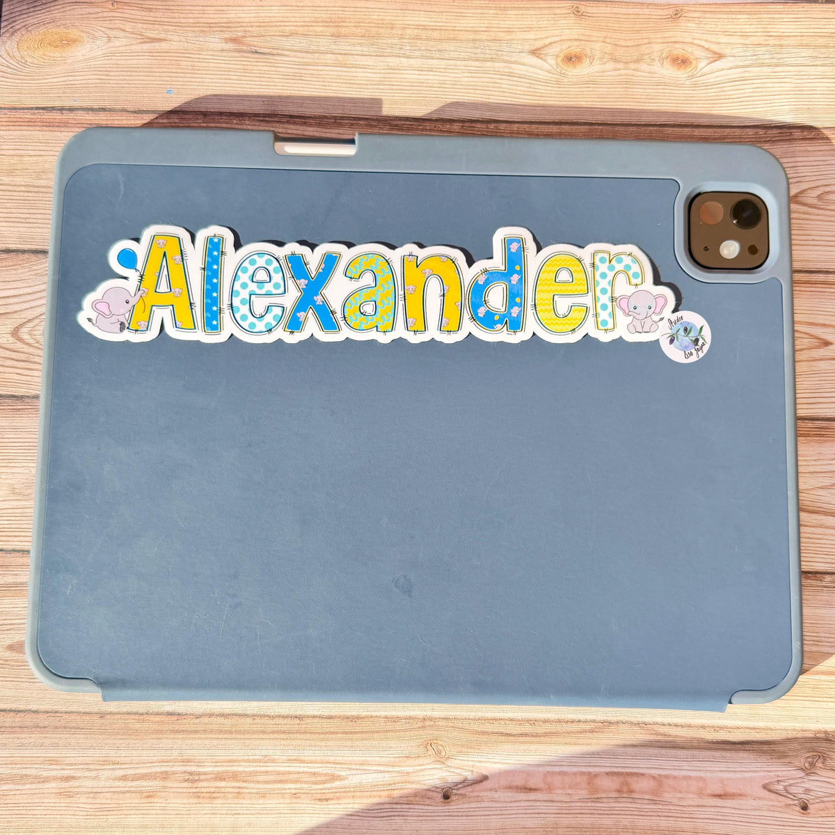 Elephants Name Sticker Label Kids - a blue tablet case with an Alexander name sticker on it