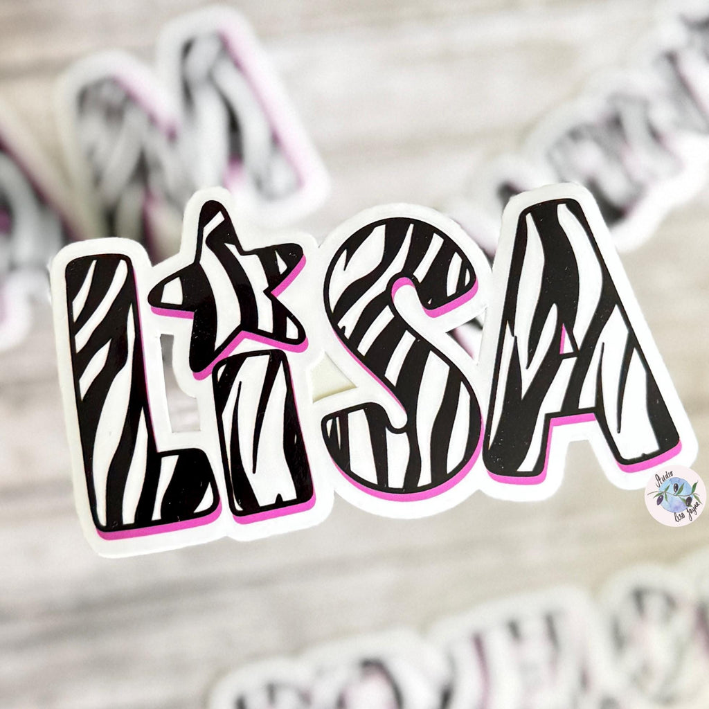 Zebra Print Name Sticker Label Kids - a close up of a Lisa purple zebra sticker
