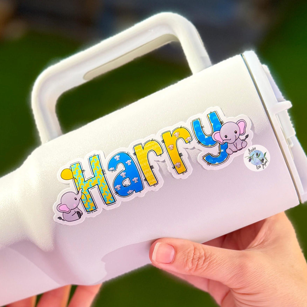 Elephants Name Sticker Label Kids - a hand holding a white water drink bottle with Harry elephant name decal