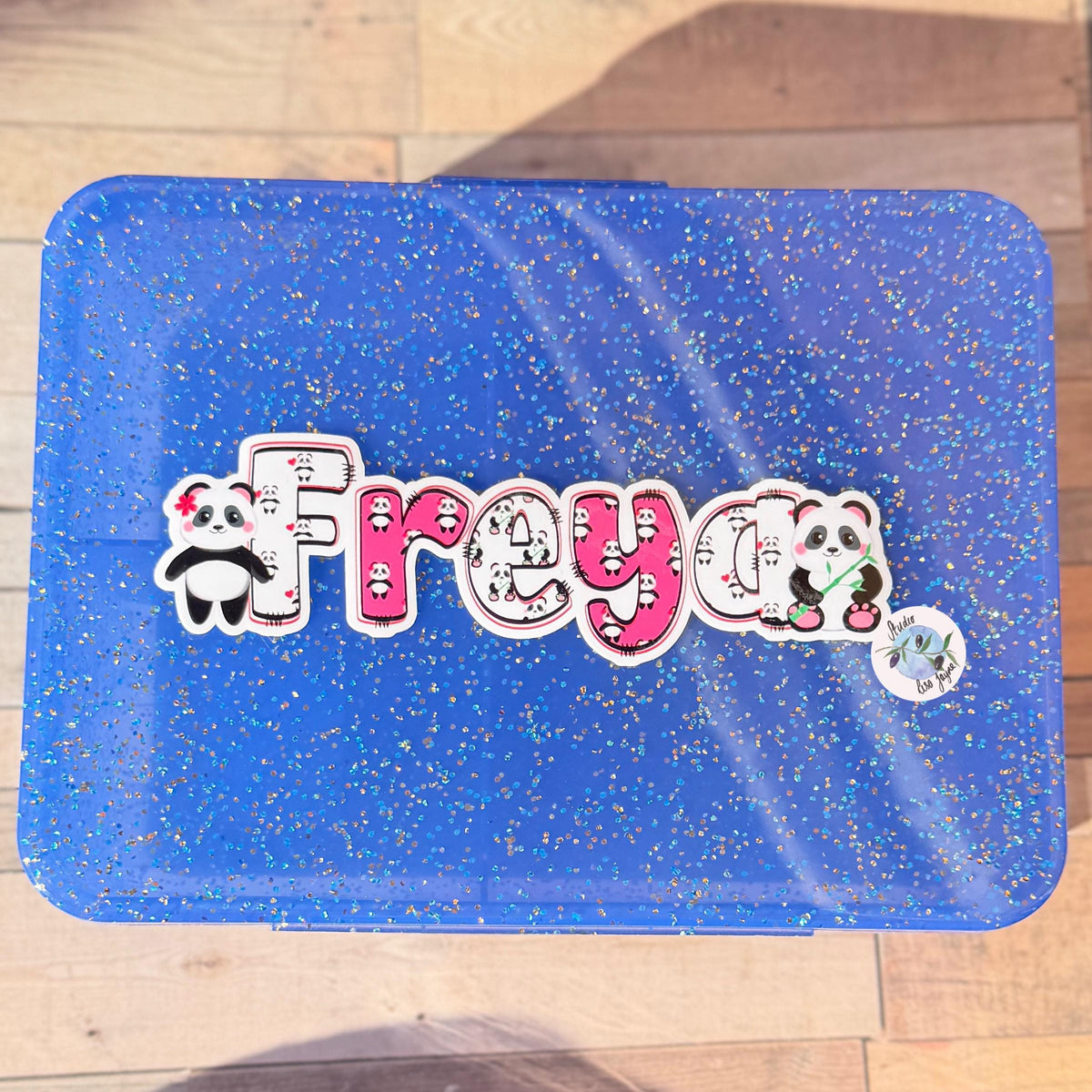 Panda Name Sticker Label Kids - a blue lunch box with a Freya name sticker on it