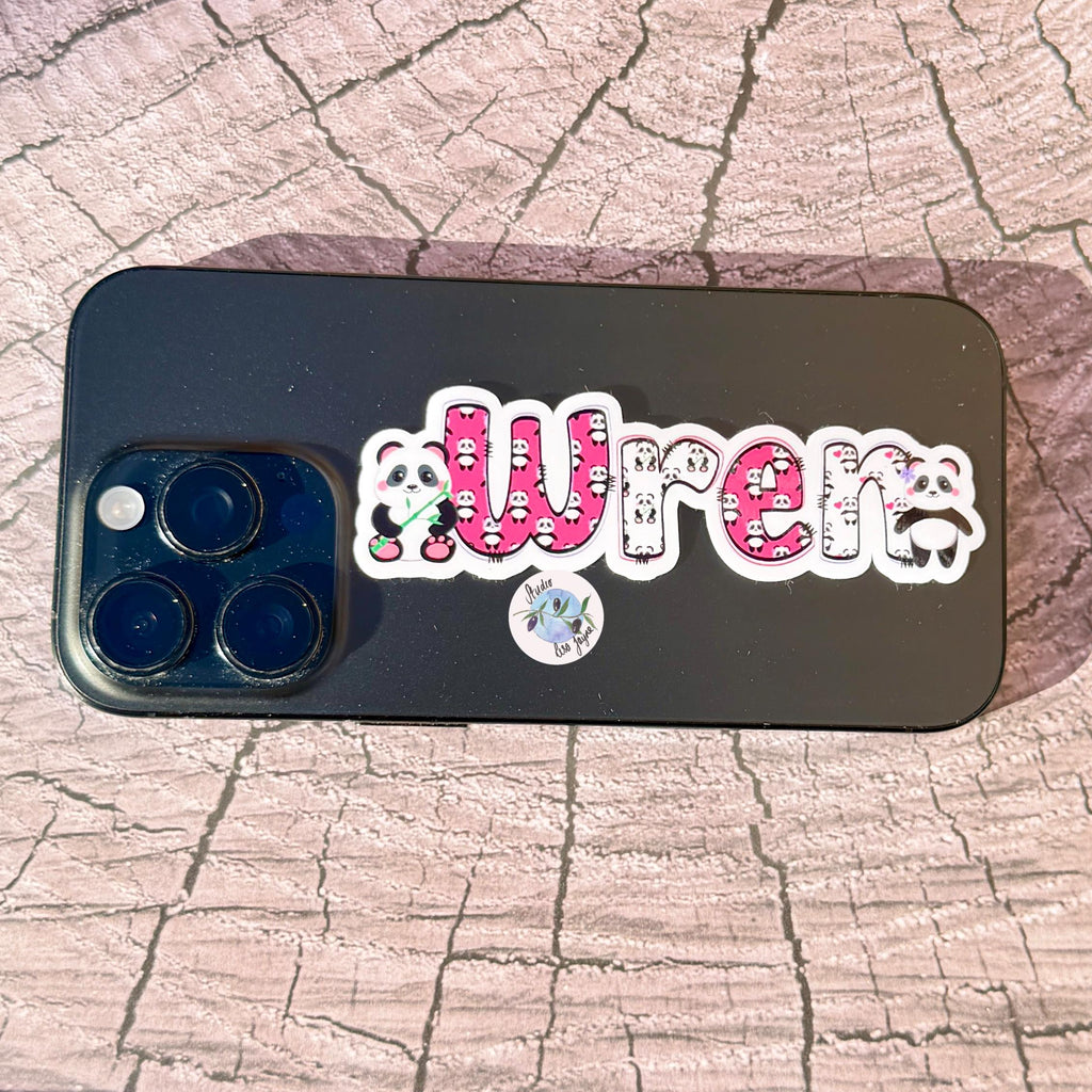 Panda Name Sticker Label Kids - a black iPhone with Wren panda themed name stickers
