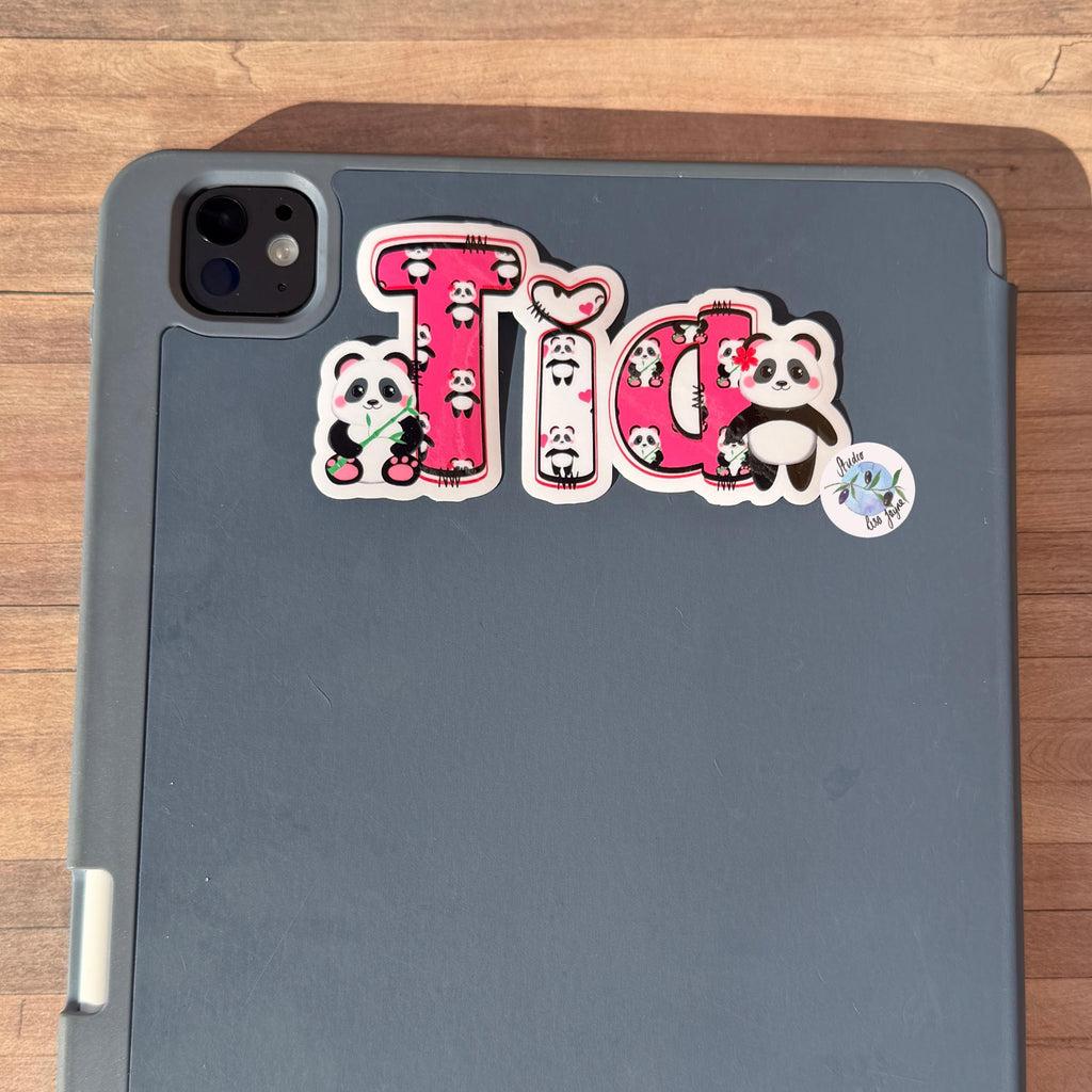 Panda Name Sticker Label Kids - a grey tablet with stickers on it