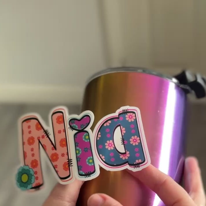 Retro Floral Personalised Name Waterproof Vinyl Sticker applied to water drink bottle