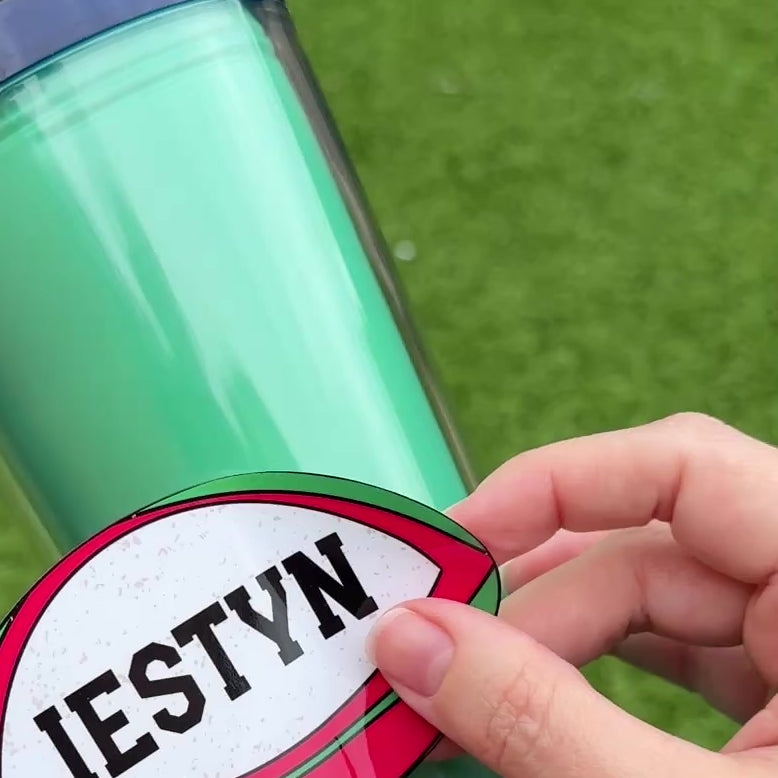 Rugby Name Personalised Waterproof Vinyl Name Sticker Label.  Welsh Wales Cymru rugby ball name sticker applied to a water drink bottle