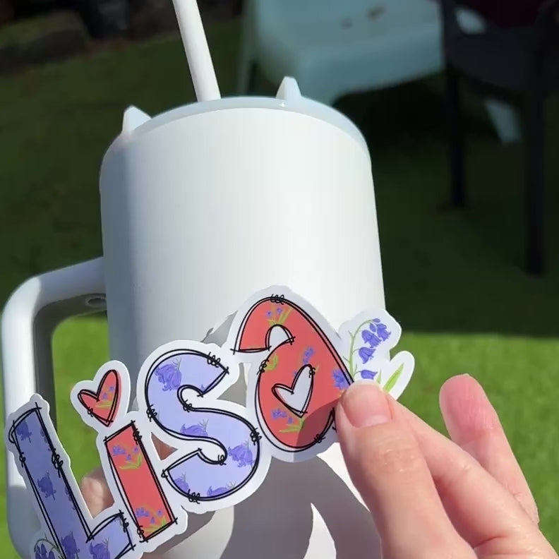 Bluebell Floral Personalised Name Sticker applied to a water drink bottle