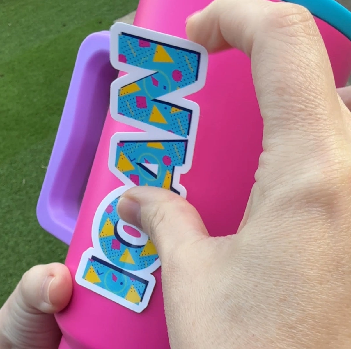 80s Style Personalised Waterproof Vinyl Name Sticker Patterned Geometric Retro Applied to bright pink drink bottle