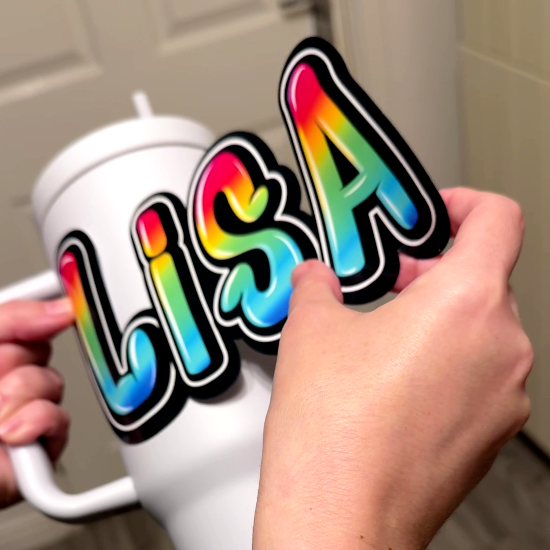 Graffiti Name Stickers Rainbow Sticker applied to a wate drink bottle