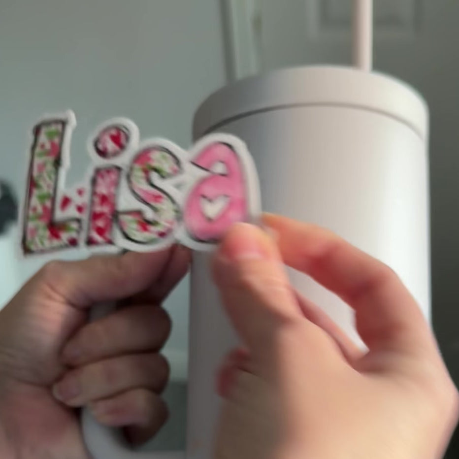 Love Heart Floral vinyl stickers being applied to drink water bottle