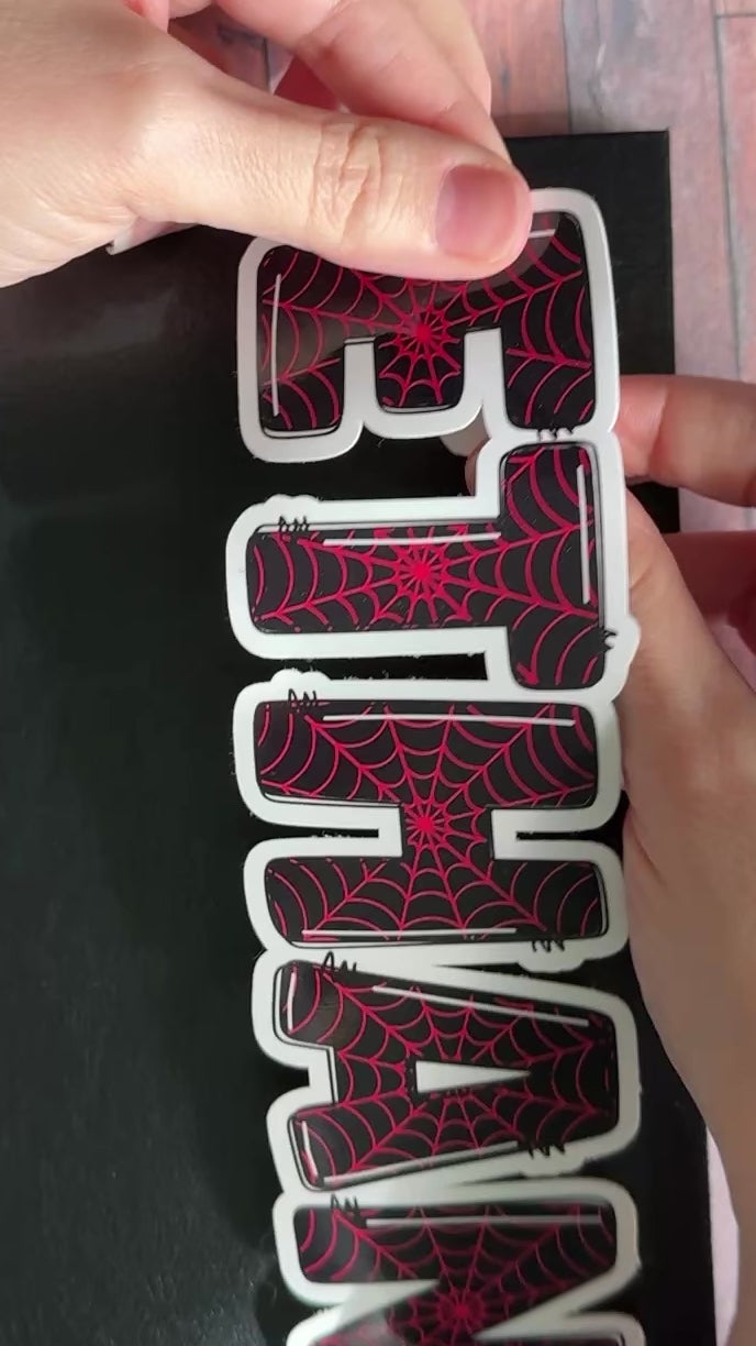Spider man and woman themed personalised name stickers.  Available in Red, Black and Pink.  Waterproof vinyl labels.  

Miles Morales Black Spin Spider-Man themed sticker applied to old notebook journal